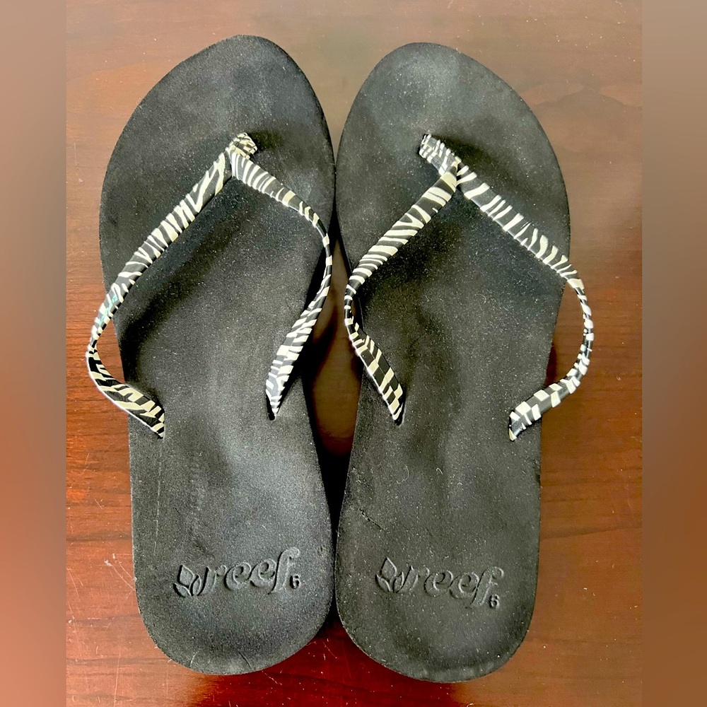 Reef Black Flip Flops with Zebra Straps